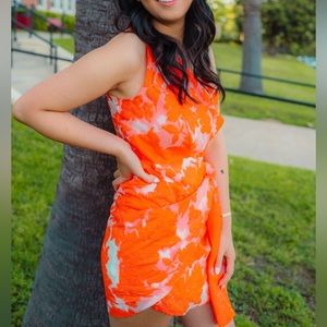 Beautiful orange dress. Worn once! Perfect for any event